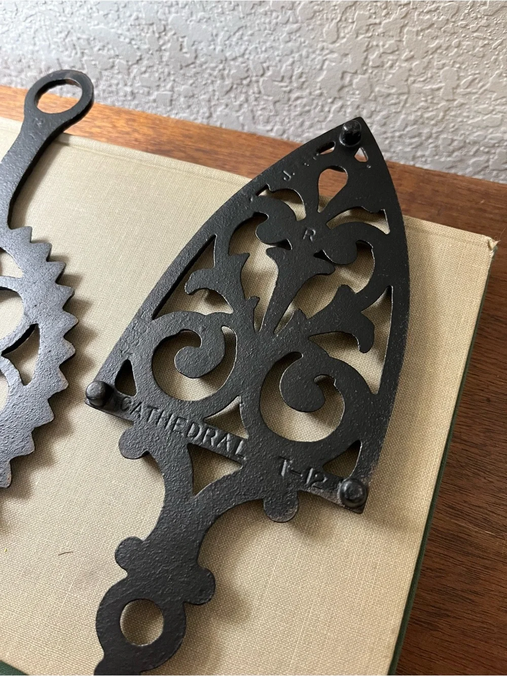 Set of 2 vintage cast iron trivets